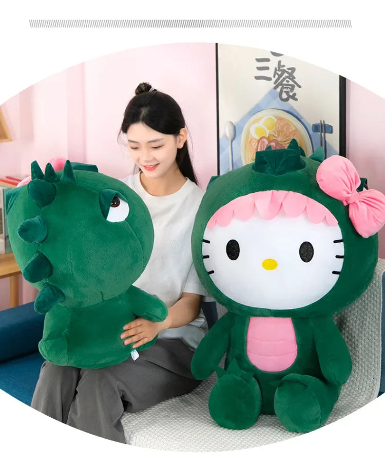 Green and pink Hello Kitty dressed in dinasour plush toy