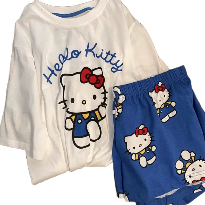 Hello Kitty pajama set with white shirt and blue shorts on a white background